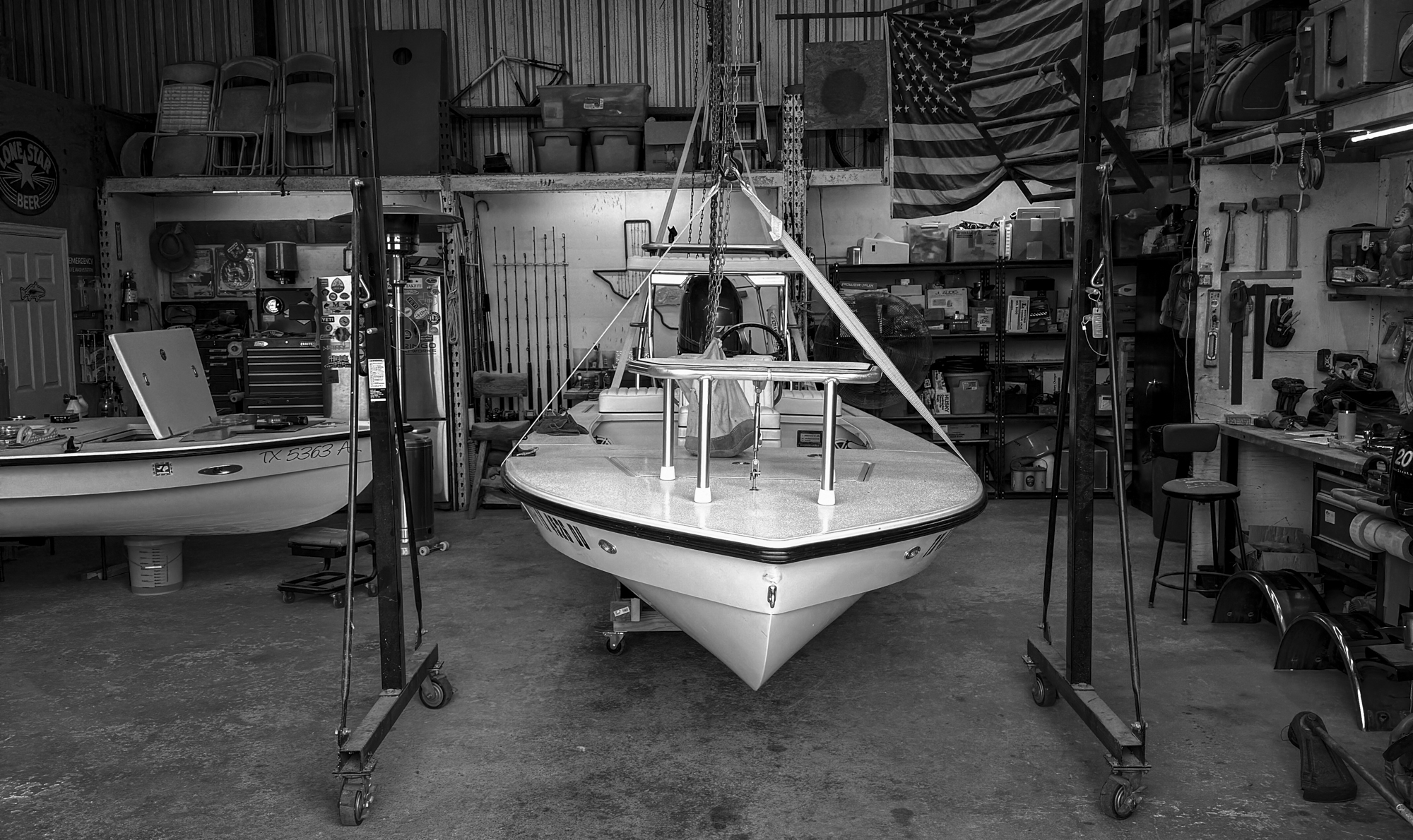 skiff slung in shop BW